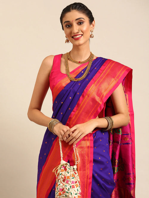 Closeup of Maharani Nauvari Paithani saree soft silk 9 yard Kashta saree in indigo blue and pink with Paithani design details