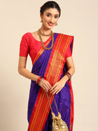 Closeup of Maharani Nauvari Paithani saree silk blend 9 yard Kashta saree in indigo blue and red with Paithani design details