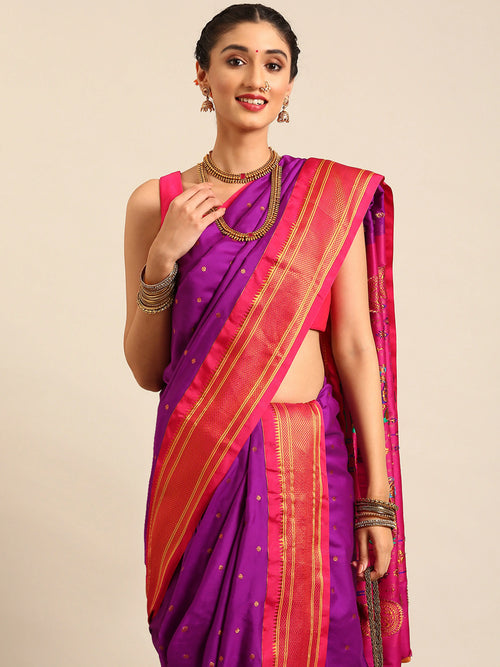 Closeup of Maharani Nauvari Paithani saree soft silk 9 yard Kashta saree in purple and pink with Paithani design details