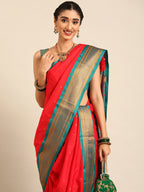 Closeup of Maharani Nauvari Paithani saree soft silk 9 yard Kashta saree in red and rama with Paithani design details