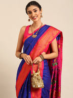 Closeup of Maharani Nauvari Paithani saree silk blend 9 yard Kashta saree in royal blue and pink with Paithani design details