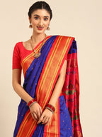 Closeup of Maharani Nauvari Paithani saree silk blend 9 yard Kashta saree in royal blue and red with Paithani design details