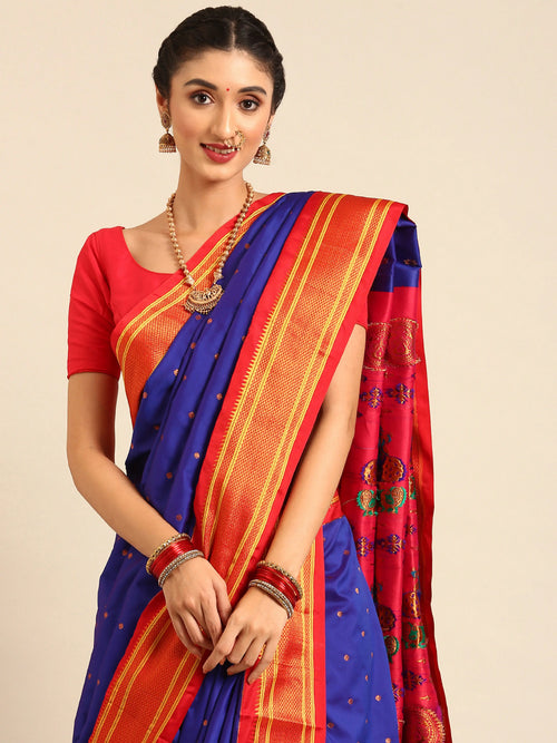 Closeup of Maharani Nauvari Paithani saree soft silk 9 yard Kashta saree in royal blue and red with Paithani design details
