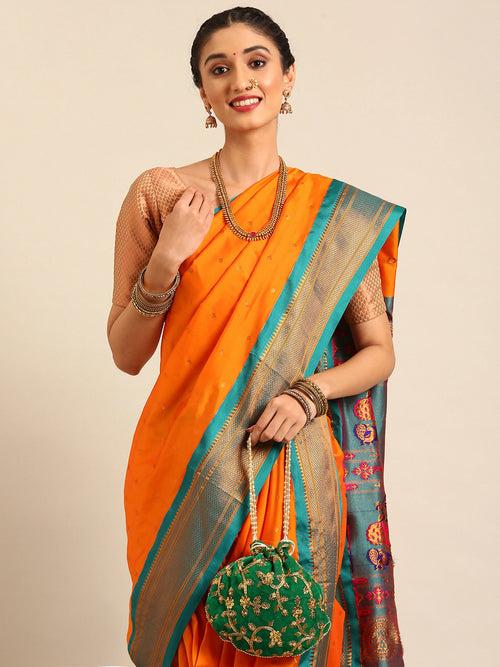 Closeup of Maharani Nauvari Paithani saree soft silk 9 yard Kashta saree in saffron and rama with Paithani design details
