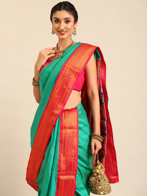 Closeup of Maharani Nauvari Paithani saree soft silk 9 yard Kashta saree in sea green and pink with Paithani design details