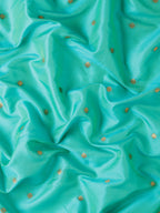Fabric detail of Maharani Nauvari Paithani saree silk blend 9 yard Kashta saree in sea green and red with silk blend texture