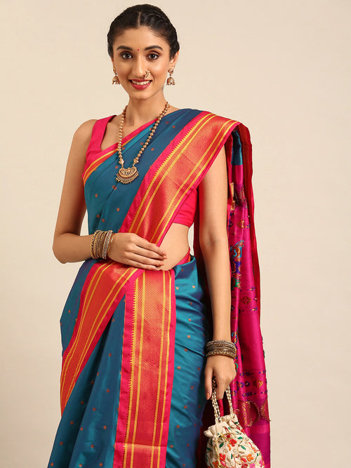 Closeup of Maharani Nauvari Paithani saree soft silk 9 yard Kashta saree in teal blue and pink with Paithani design details