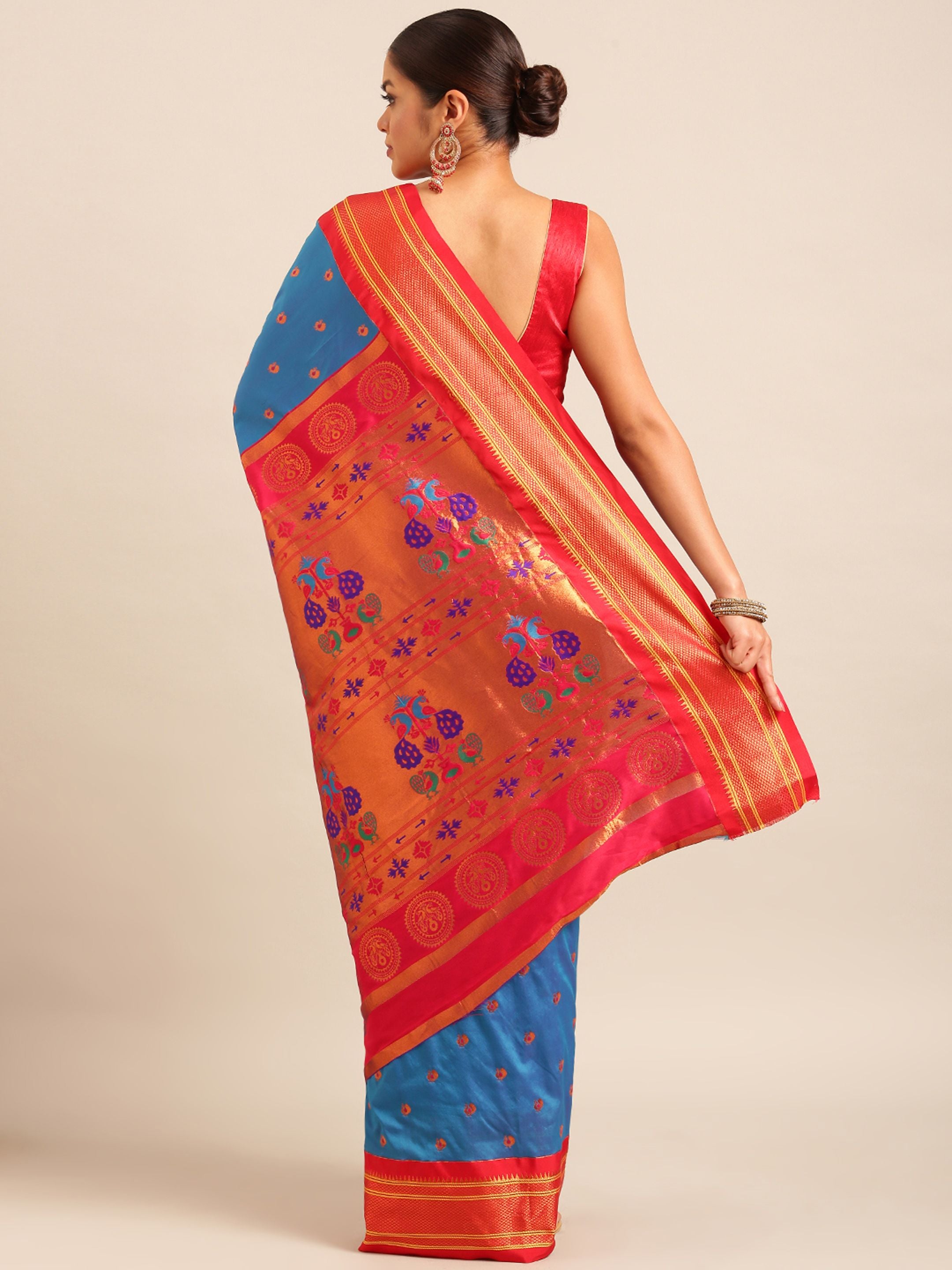 Maharani paithani saree silk blend in firozi and red with small peacock meena butti - back view showing pallu and border for wedding wear