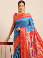Maharani paithani saree silk blend in firozi and red with small peacock meena butti - closeup view showing fabric and zari work for wedding wear