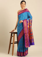 Maharani paithani saree silk blend in firozi and violet with small peacock meena butti - styled model view for wedding wear