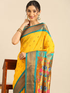 Maharani paithani saree silk blend in gold and rama with small peacock meena butti - closeup view showing fabric and zari work for wedding wear