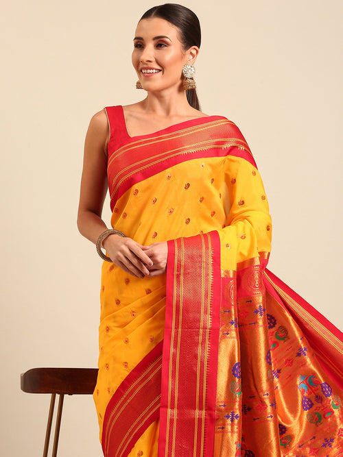 Maharani paithani saree soft silk in gold and red with small peacock meena butti - closeup view showing fabric and zari work for wedding wear
