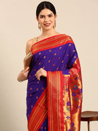 Maharani paithani saree silk blend in indigo blue and red with small peacock meena butti - closeup view showing fabric and zari work for wedding wear