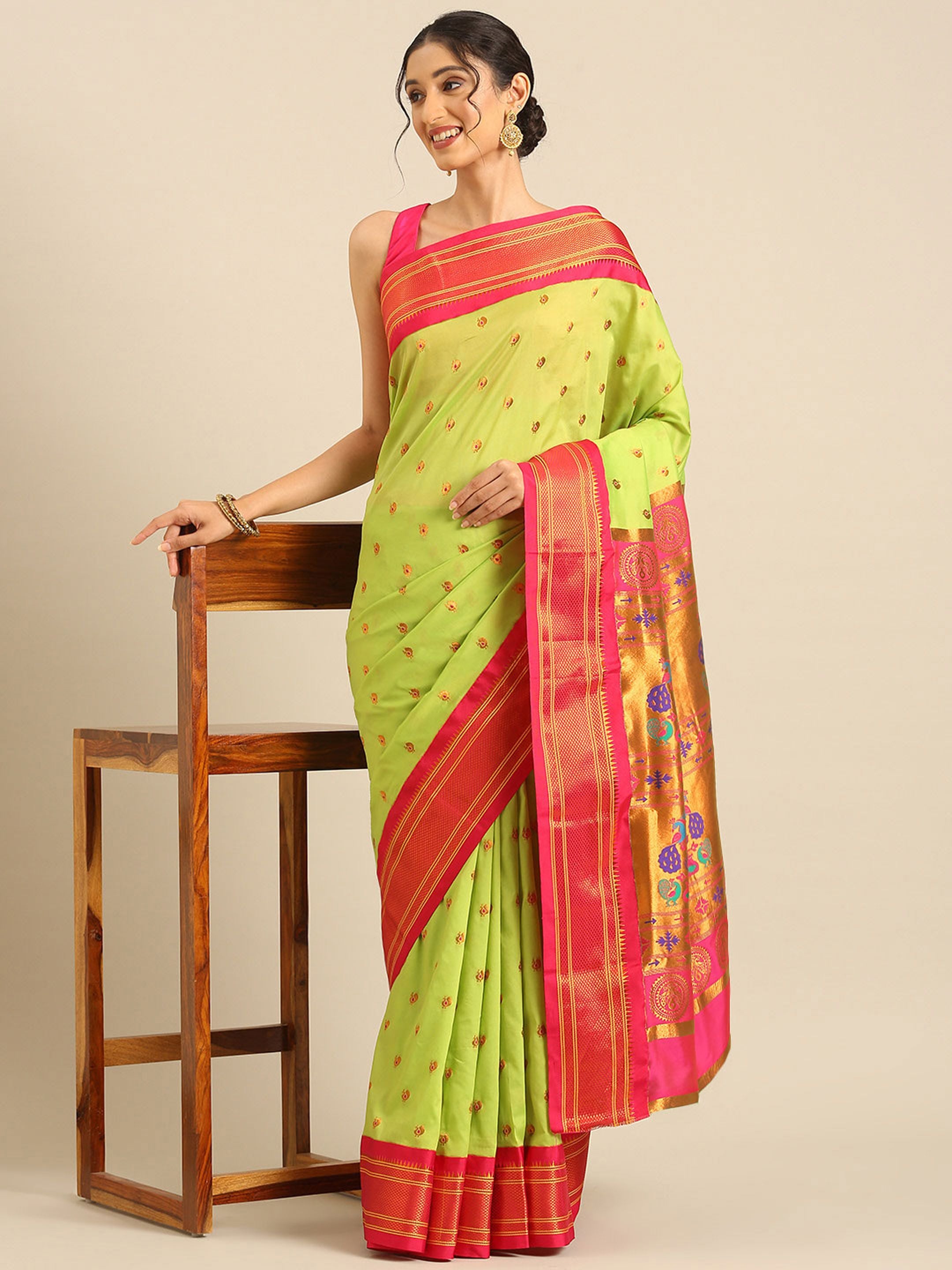 Maharani paithani saree silk blend in popati and pink with small peacock meena butti - styled model view for wedding wear