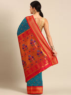 Maharani paithani saree silk blend in rama green and red with small peacock meena butti - back view showing pallu and border for wedding wear