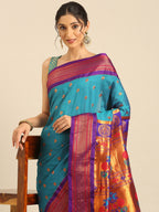 Maharani paithani saree silk blend in rama green and violet with small peacock meena butti - closeup view showing fabric and zari work for wedding wear