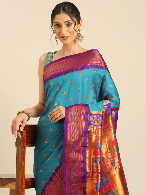 Maharani paithani saree soft silk in rama green and violet with small peacock meena butti - closeup view showing fabric and zari work for wedding wear