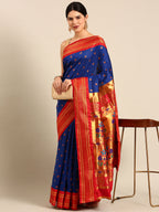 Maharani paithani saree silk blend in royal blue and red with small peacock meena butti - front view for wedding wear