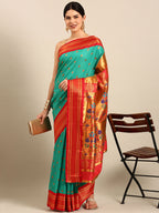 Maharani paithani saree silk blend in sea green and red with small peacock meena butti - front view for wedding wear