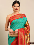 Maharani paithani saree silk blend in sea green and red with small peacock meena butti - closeup view showing fabric and zari work for wedding wear