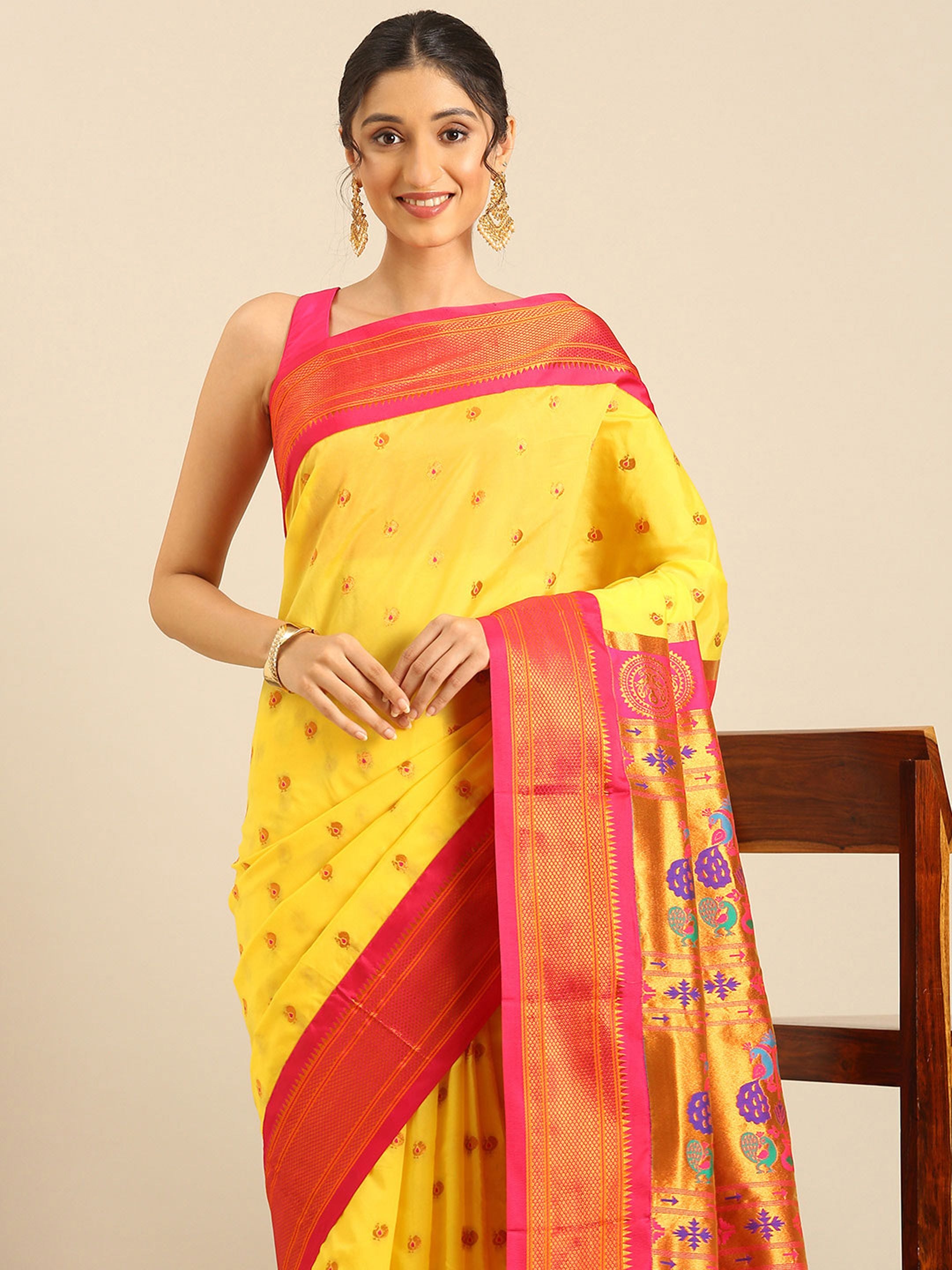 Maharani paithani saree silk blend in yellow and pink with small peacock meena butti - closeup view showing fabric and zari work for wedding wear
