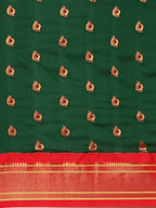 Maharani paithani saree silk blend in bottle green and red with big peacock meena butti - body fabric detail showing motif design for party wear