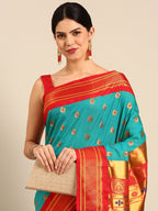 Maharani paithani saree silk blend in chintamani and red with big peacock meena butti - closeup view showing fabric and zari work for party wear