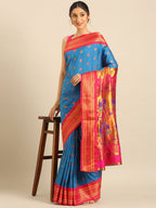 Maharani paithani saree silk blend in firozi and pink with big peacock meena butti - styled model view for party wear