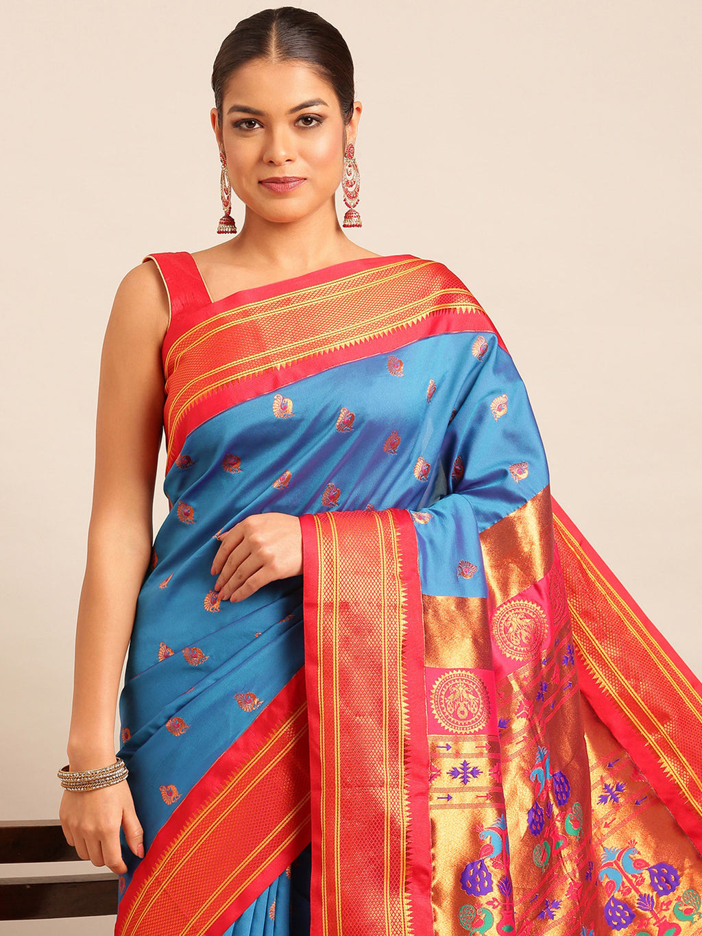 Maharani paithani saree silk blend in firozi and red with big peacock meena butti - closeup view showing fabric and zari work for party wear