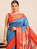 Maharani paithani saree silk blend in firozi and red with big peacock meena butti - closeup view showing fabric and zari work for party wear