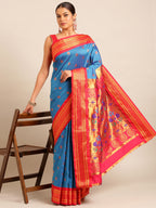 Maharani paithani saree silk blend in firozi and red with big peacock meena butti - styled model view for party wear