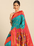 Maharani paithani saree silk blend in rama green and pink with big peacock meena butti - closeup view showing fabric and zari work for party wear
