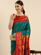 Maharani paithani saree silk blend in rama green and red with big peacock meena butti - closeup view showing fabric and zari work for party wear