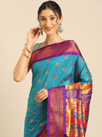 Maharani paithani saree silk blend in rama green and violet with big peacock meena butti - closeup view showing fabric and zari work for party wear