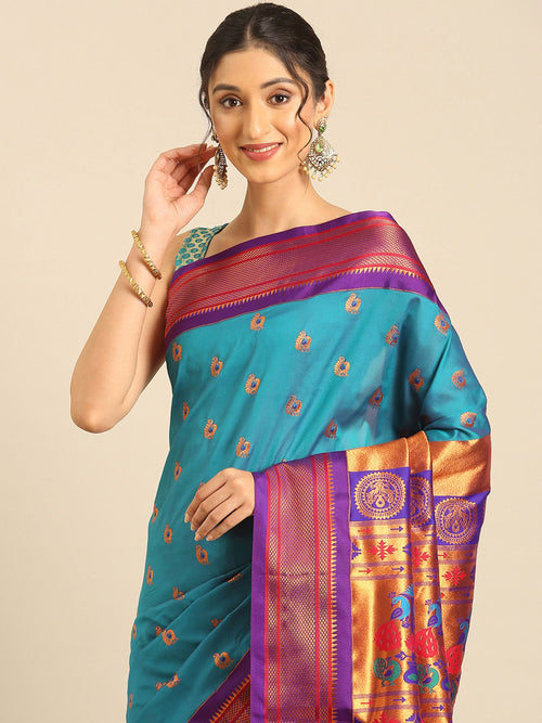 Maharani paithani saree soft silk in rama green and violet with big peacock meena butti - closeup view showing fabric and zari work for party wear