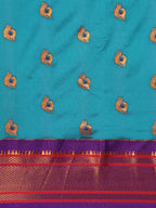 Maharani paithani saree silk blend in rama green and violet with big peacock meena butti - body fabric detail showing motif design for party wear