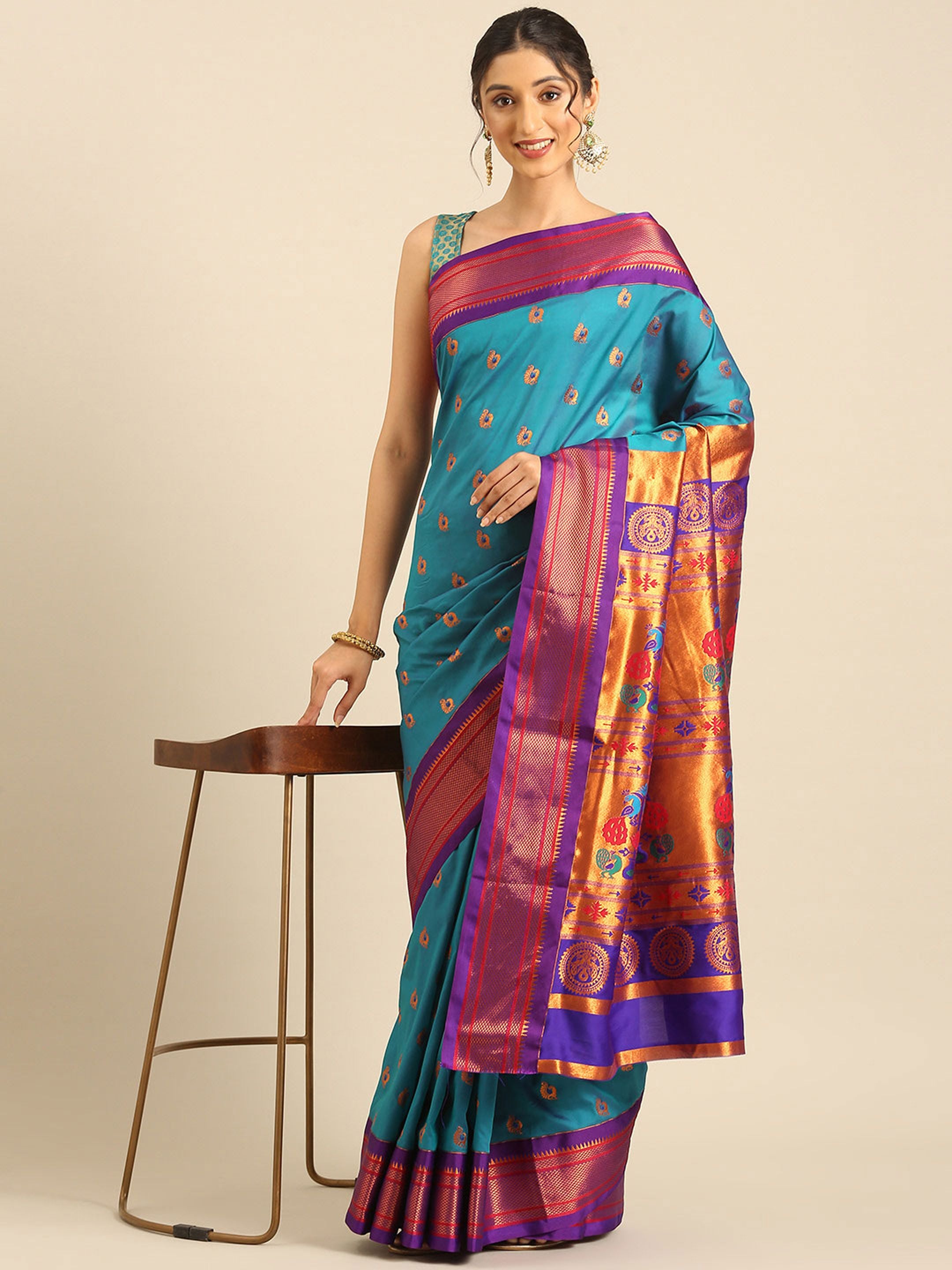 Maharani paithani saree silk blend in rama green and violet with big peacock meena butti - styled model view for party wear