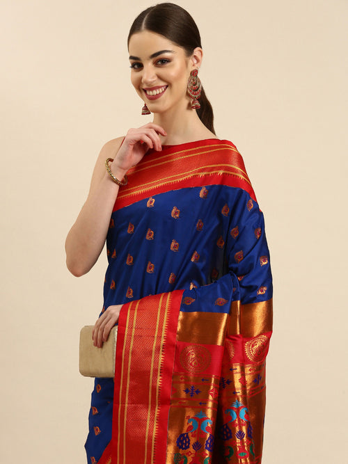 Maharani paithani saree soft silk in royal blue and red with big peacock meena butti - closeup view showing fabric and zari work for party wear