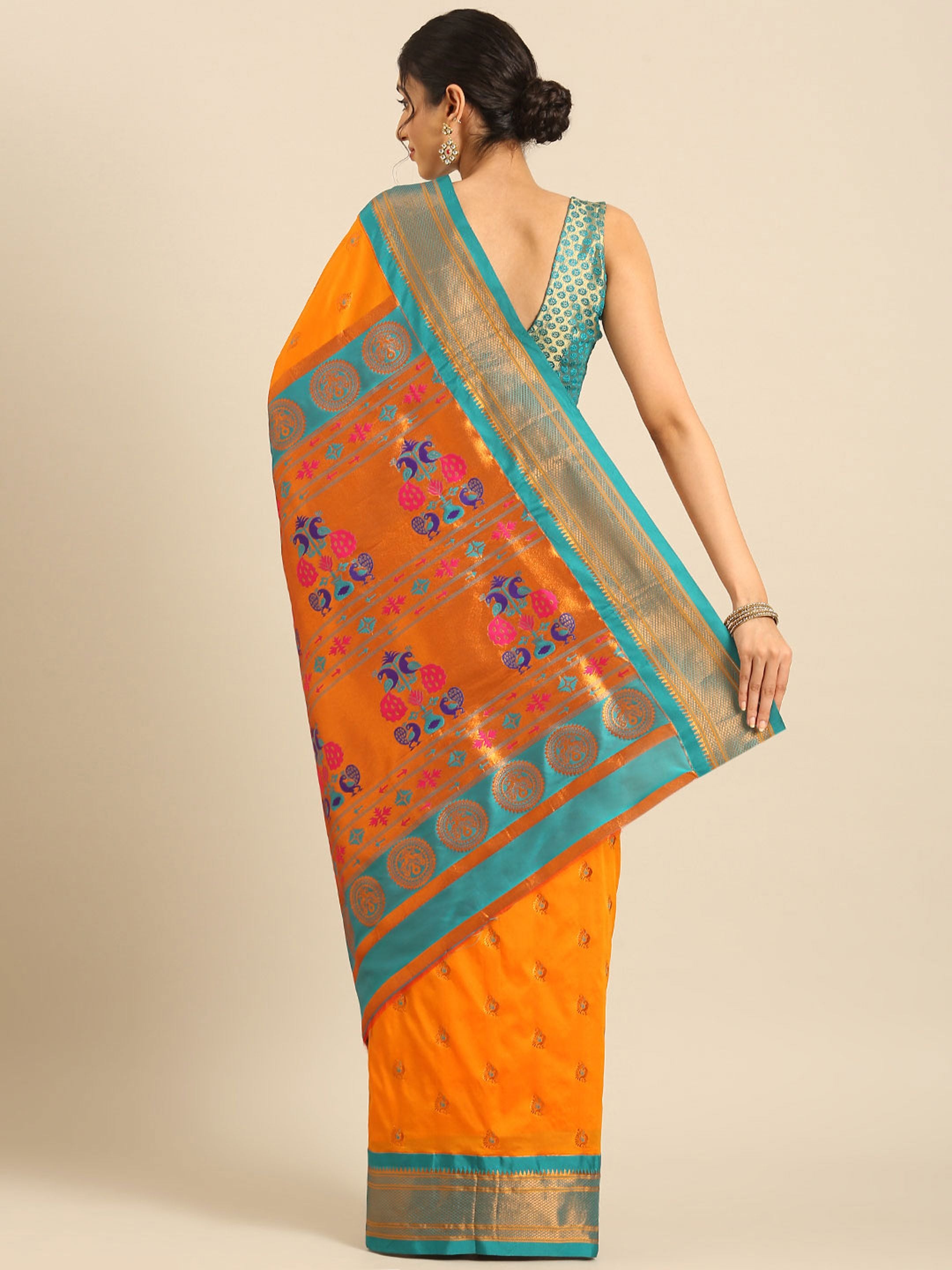 Maharani paithani saree silk blend in saffron and rama with big peacock meena butti - back view showing pallu and border for party wear
