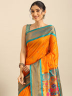 Maharani paithani saree silk blend in saffron and rama with big peacock meena butti - closeup view showing fabric and zari work for party wear