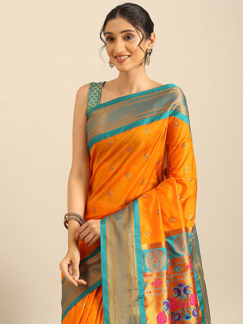 Maharani paithani saree soft silk in saffron and rama with big peacock meena butti - closeup view showing fabric and zari work for party wear