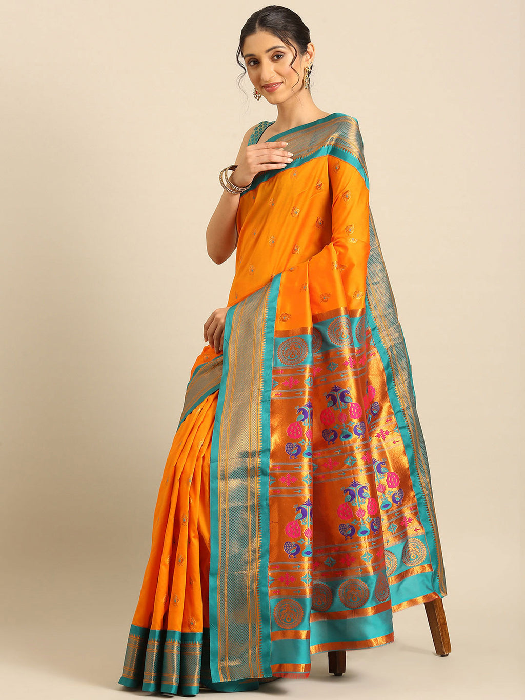 Maharani paithani saree silk blend in saffron and rama with big peacock meena butti - styled model view for party wear