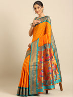 Maharani paithani saree silk blend in saffron and rama with big peacock meena butti - styled model view for party wear