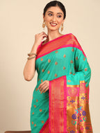 Maharani paithani saree silk blend in sea green and pink with big peacock meena butti - closeup view showing fabric and zari work for party wear