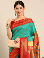 Maharani paithani saree silk blend in sea green and red with big peacock meena butti - closeup view showing fabric and zari work for party wear