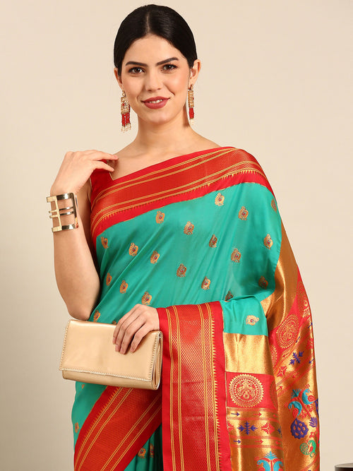 Maharani paithani saree soft silk in sea green and red with big peacock meena butti - closeup view showing fabric and zari work for party wear