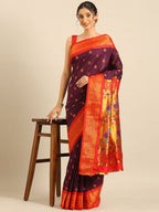 Maharani paithani saree silk blend in wine red with big peacock meena butti - styled model view for party wear